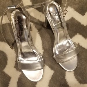 Silver heels never worn